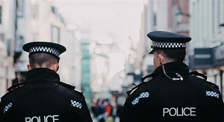 Police walking down high street